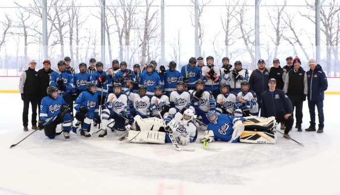 Dwayne Green with youth hockey team.