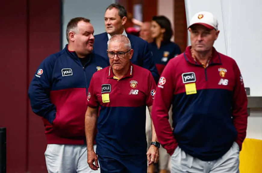 Professional sports staff walking together through a venue