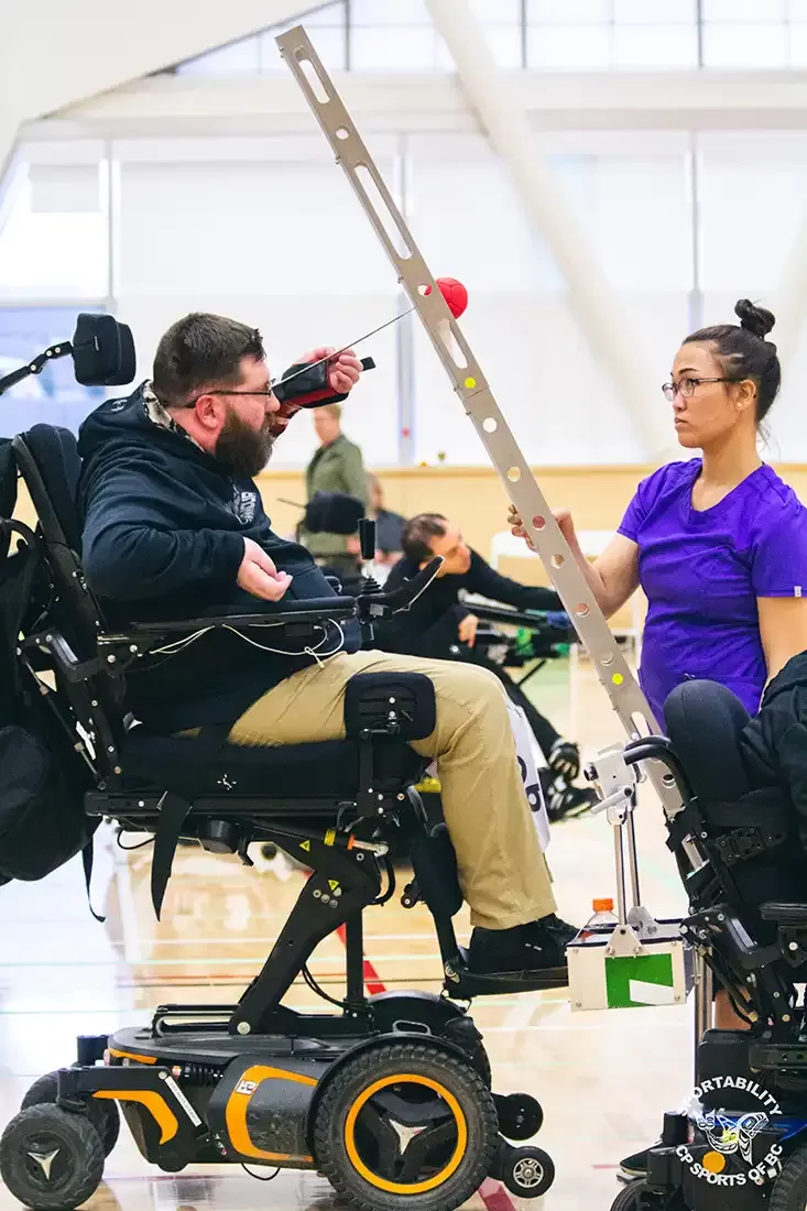 Adapted sport instruction with a participant