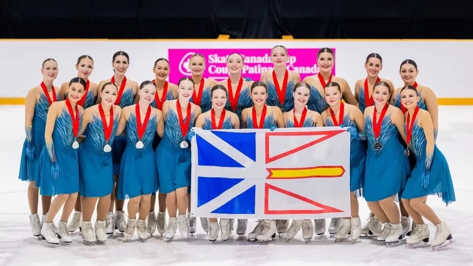 The Open Starlites celebrated for their silver medal at the 2026 Skate Canada Cup.