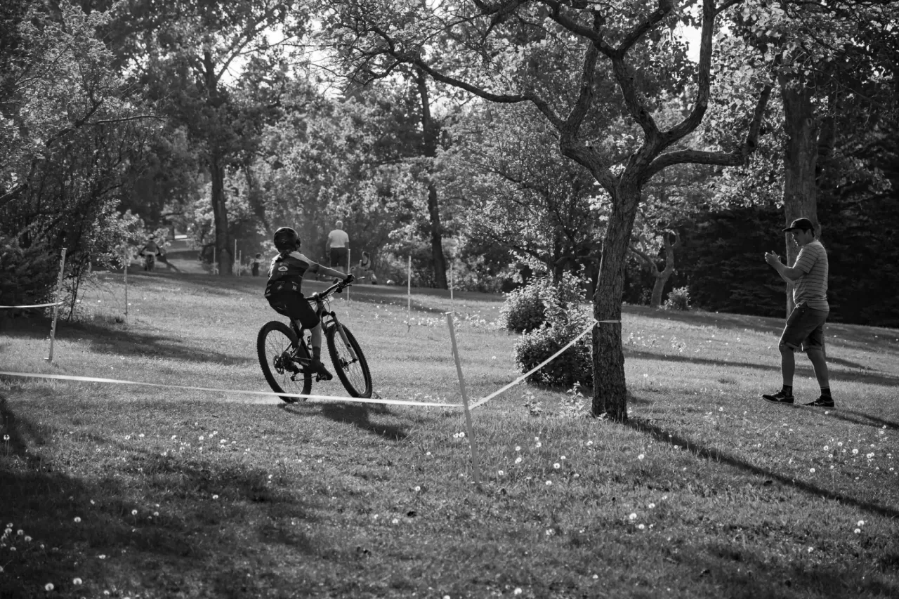 Youth cycling activity in a park