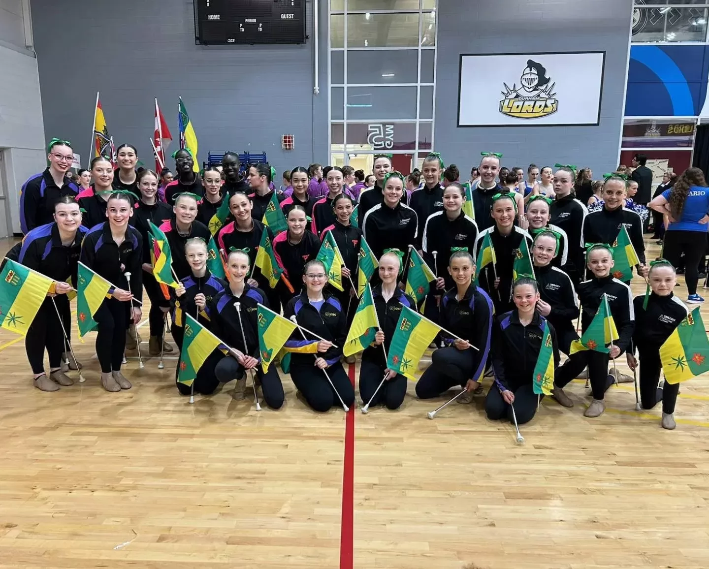 Baton twirling team gathering featured by Saskatchewan Baton Twirling Association.