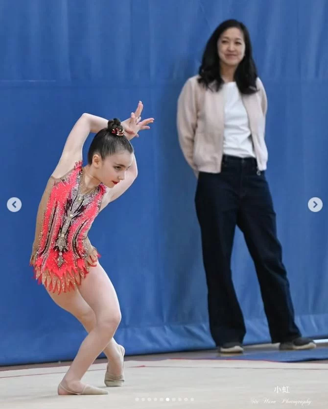 Rhythmic gymnast and coach