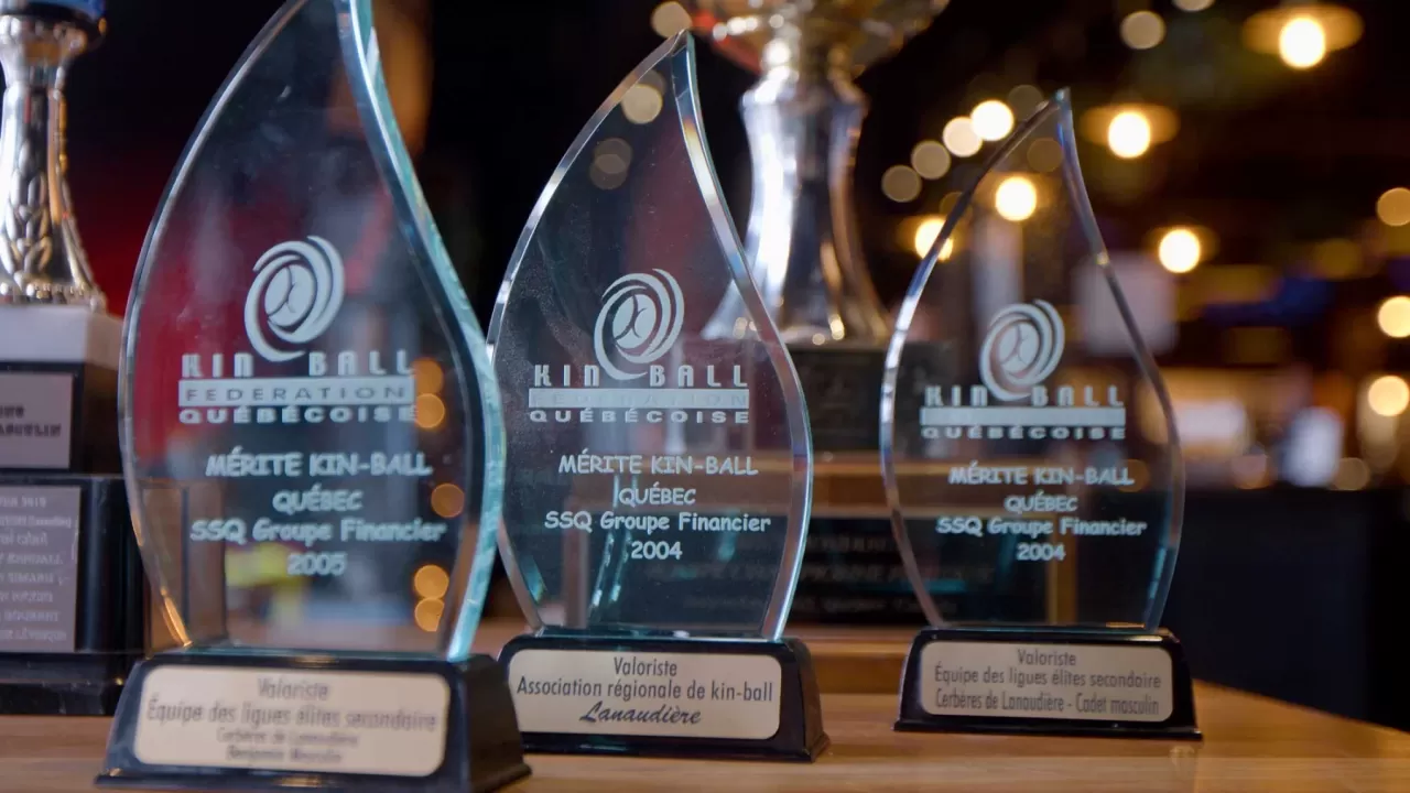Trophies from a Québec kin-ball championship featured by Kin-Ball Québec.