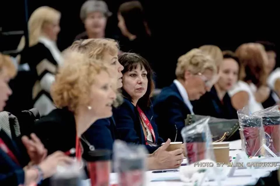 Officials at a rhythmic gymnastics event